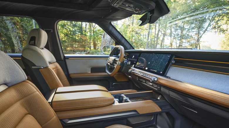 The Scout Traveler EV interior dashboard controls and seats