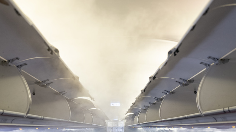 Fog filling up empty airplane cabin