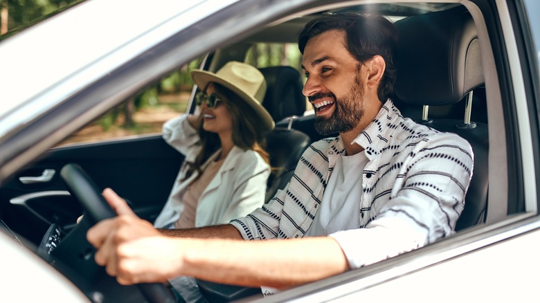 couple driving car