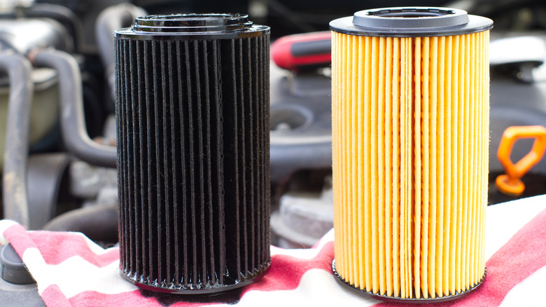 Old and new car oil filters