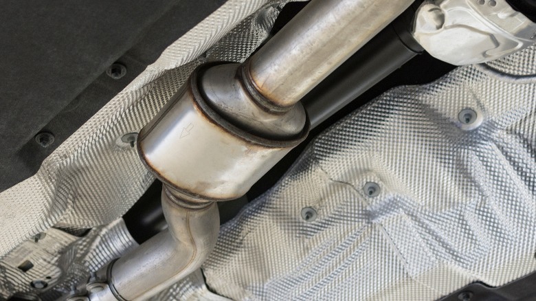 close-up of a catalytic converter (cat) under a car