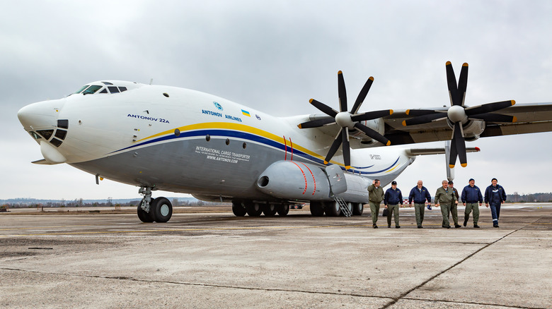 Parked Antonov An-22 with flight crew