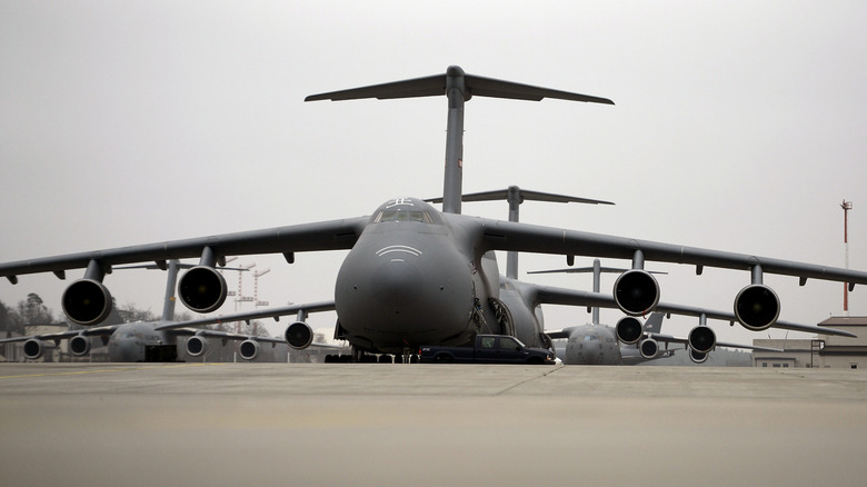 Multiple Lockheed C-5 Galaxy aircraft on tarmac