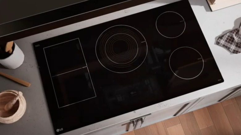 An LG smart induction cooktop in a counter.