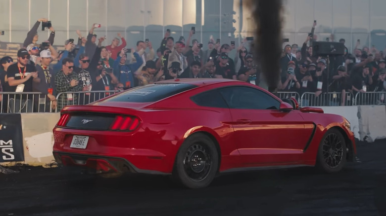 Cummins engine Mustang burnouts in front of crowd