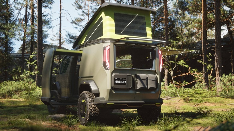 A tent perched on top of the Kia PV5 WKNDR CONCEPT