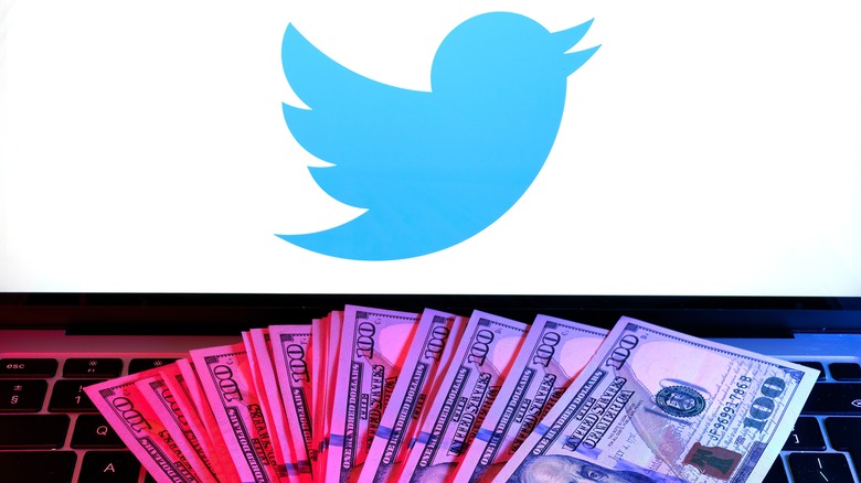 Money and Twitter logo