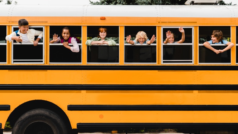 Children in a school bus. 