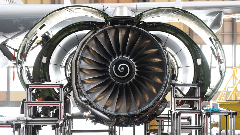 Jet engine turbine in hangar