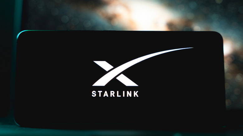 Starlink hardware illuminated with Starlink logo