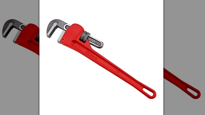 Pipe wrench on white background