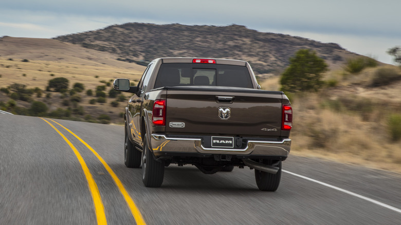 ram truck driving tailgate view