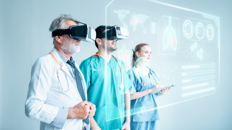 Doctors wearing VR headsets