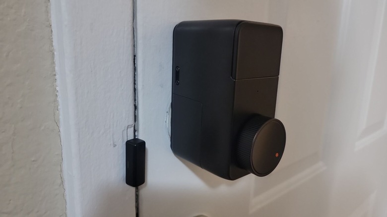 SwitchBot Lock Pro and magnet installed on door