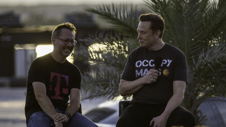 Elon Musk and T-Mobile CEO announcing their collaboration in 2022