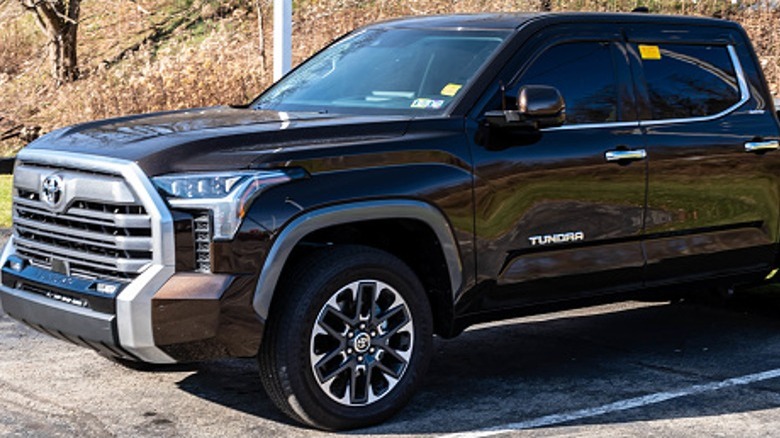 Brown Toyota Tundra at a sale lot