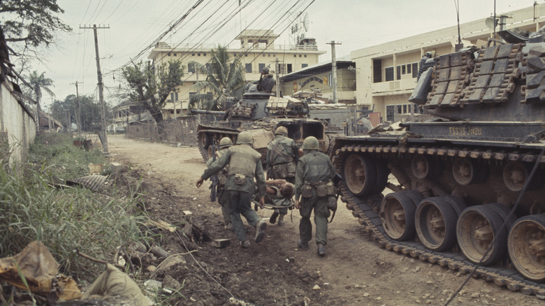 Tank with several soldiers