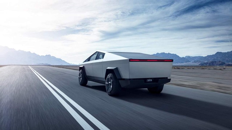 Tesla Cybertruck electric pickup on a highway 