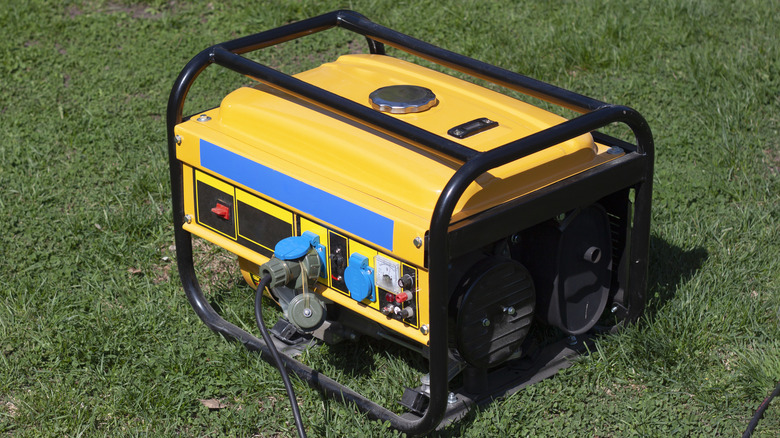 Portable generator sitting on grass