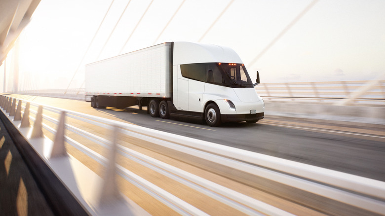 A render of a Tesla Semi on a bridge