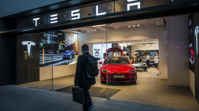 Man in front of Tesla store