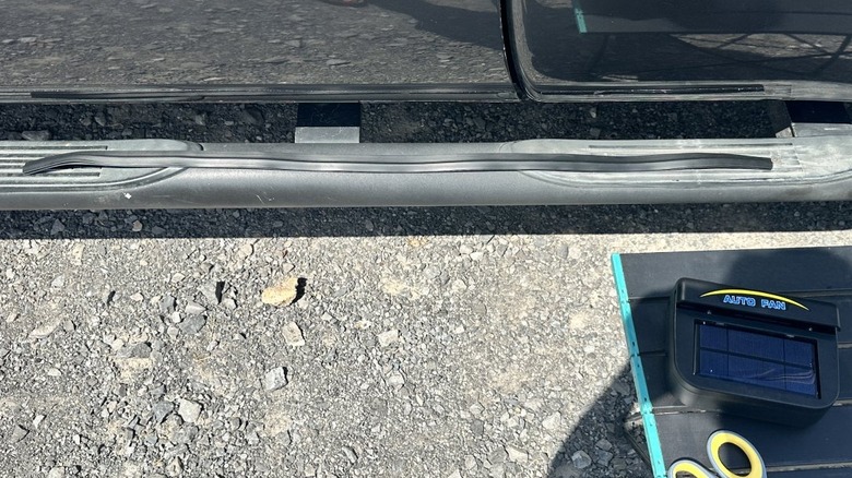 window gasket lying on truck foot rails