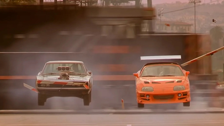 A shot from the final race of The Fast and the Furious in which Dominic Toretto and Brian O'Conner jump in front of a speeding train.