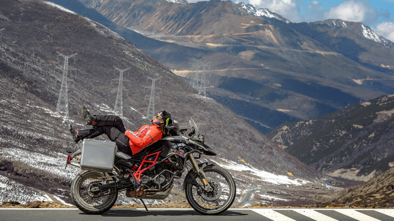 Woman relaxing on a BMW F800GS