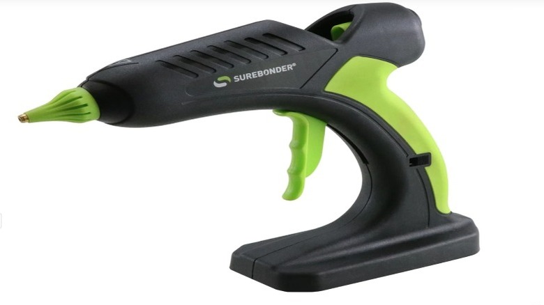 Black and green Surebonder glue gun