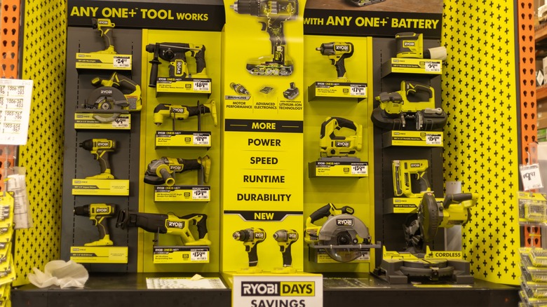 Selection of Ryobi power tools on a retail display