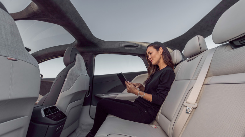 Woman Sitting Lucid Air