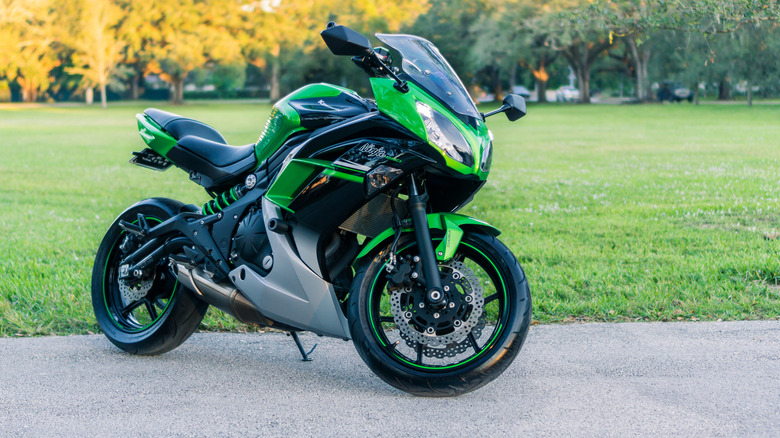 A Kawasaki Ninja 650 in a park