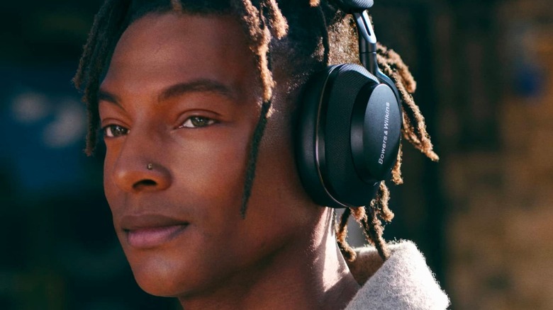 person wearing Bowers & Wilkins Px7 S2 headphones