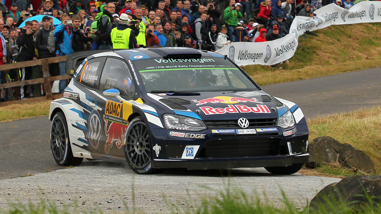 Crowd watches Volkswagen Polo WRC