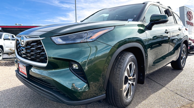 Toyota Highlander Hybrid outside a dealership