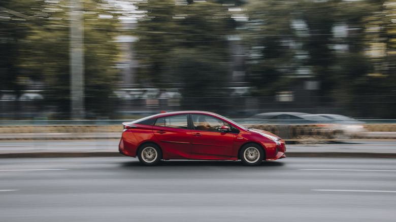 Red Prius on a road