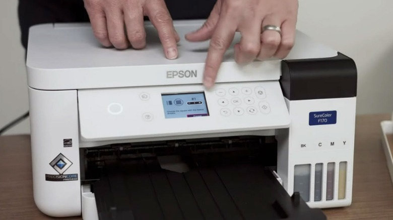 A Epson SureColor F170 Dye-Sublimation Printer against a white backdrop