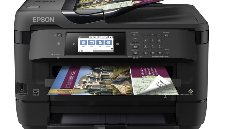 An Epson WorkForce WF-7720 with two sample sheets printing.