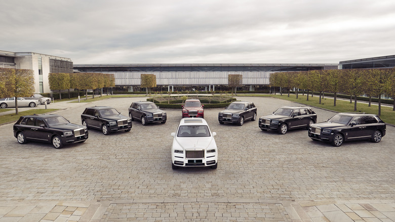 Lineup of Rolls-Royce Cullinans outside the factory