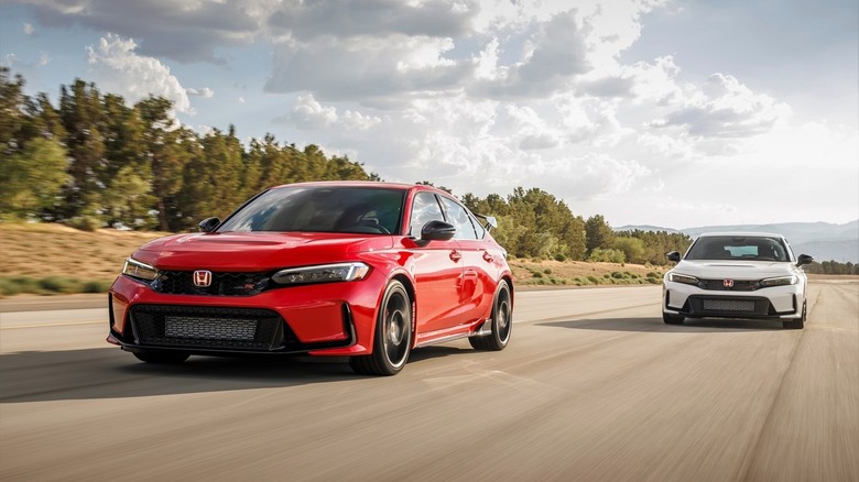 Two Honda Civic Type R cars on track