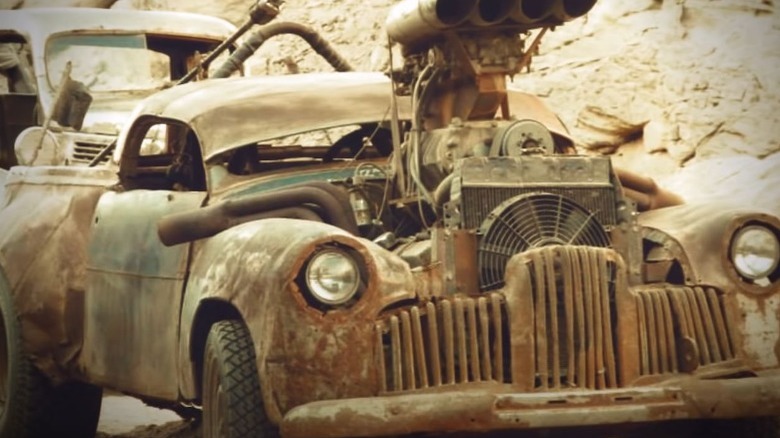 Cranky Frank being driven in wasteland