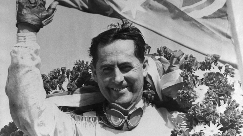 Jack Brabham  with his arm in the air