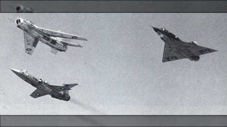 PAF's 3-ship formation consisting of a Shenyang F-6, Lockheed F-104 & Dassault Mirage-III