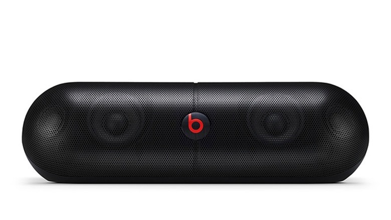 A black Apple Beats Pill XL speaker on a white background