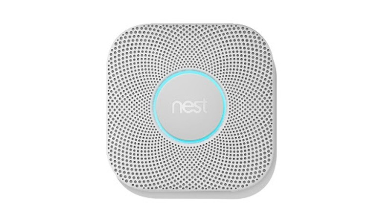 A Google Nest Lab Smoke Detector on a white background