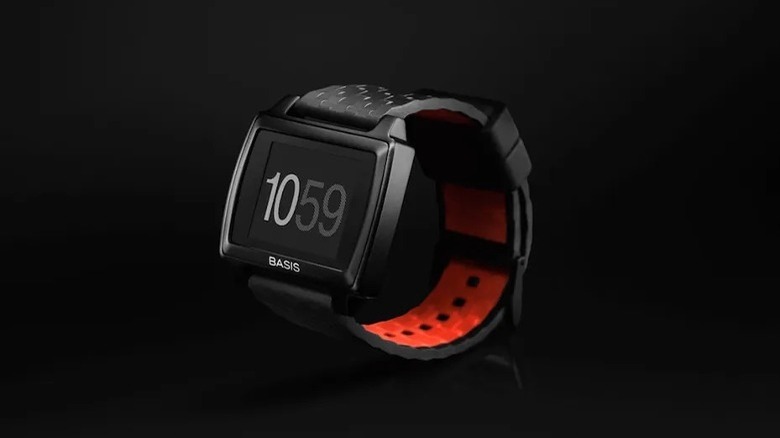 A black Intel Basis Fitness Smart Watch whose black band has an orange interior