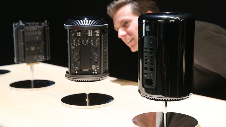 A man looking at the Mac Pro