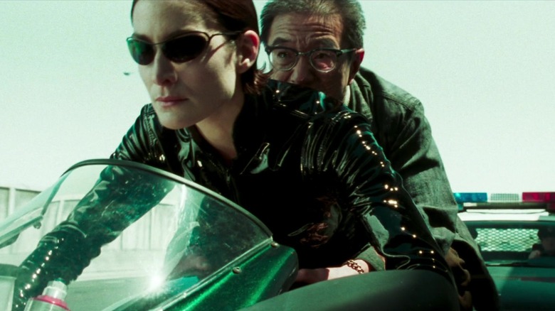 Carrie-Anne Moss on a Ducati