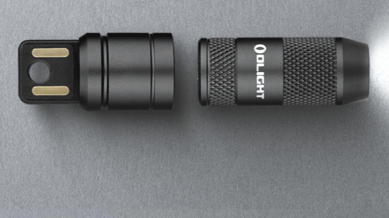 Olight imini 2 flashlight separated from base