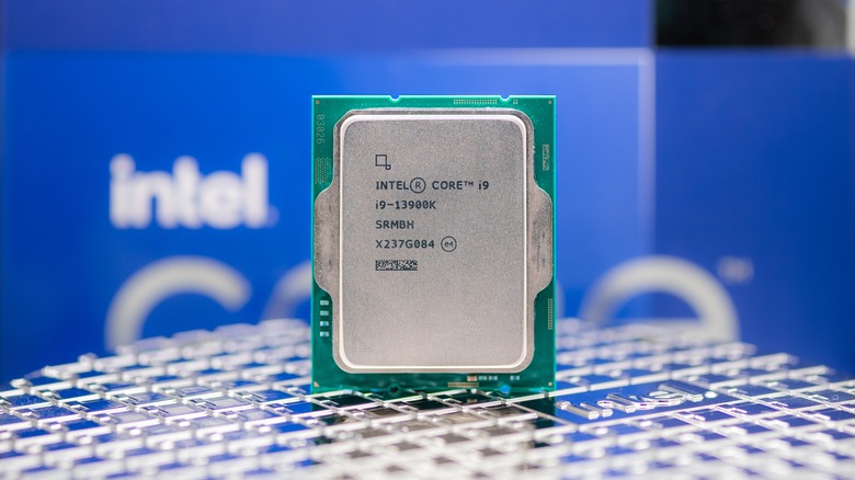 Intel Core i9-13900K CPU with box in background